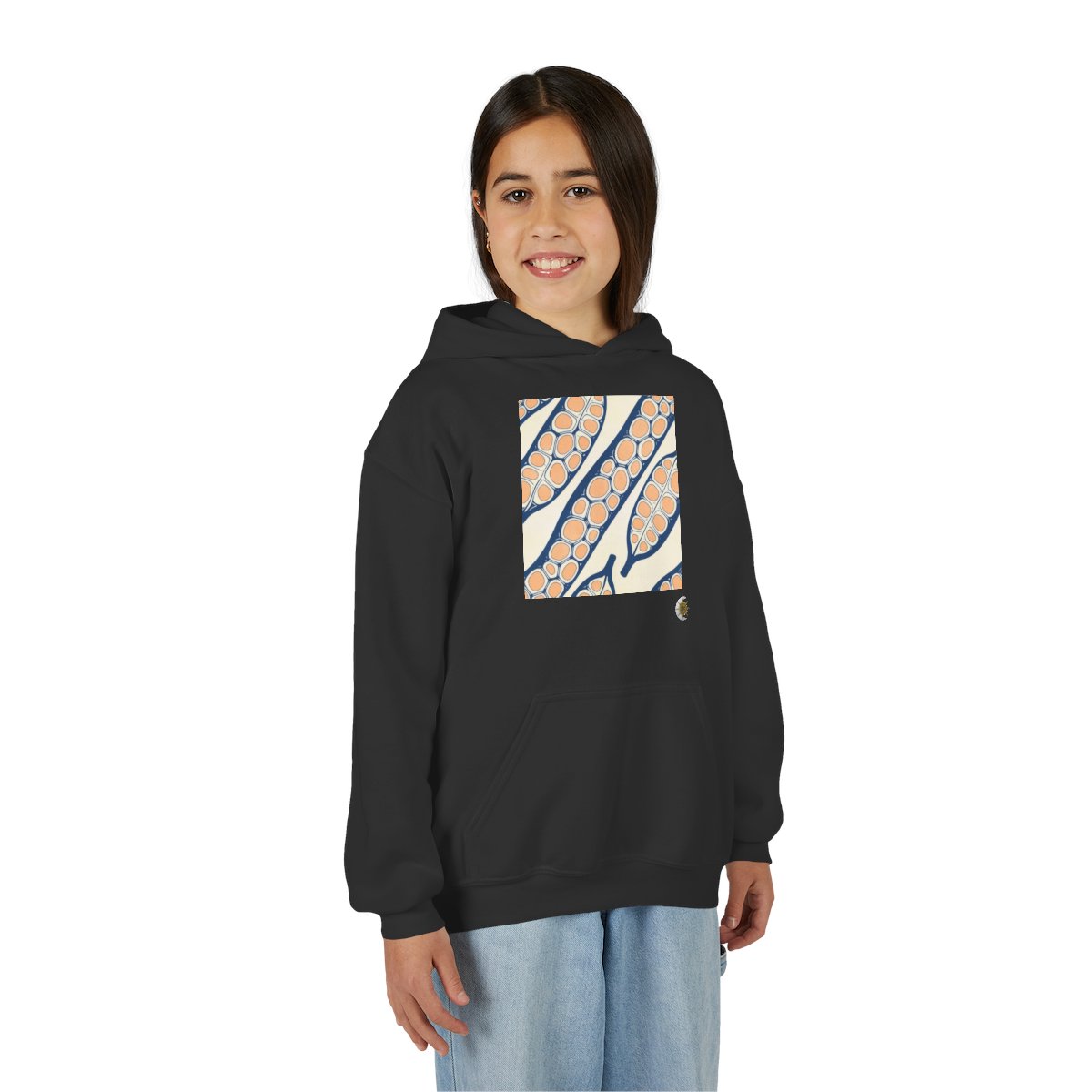 HD Apricot Seedpods Youth Pullover Hoodie in Black, front view on a model.