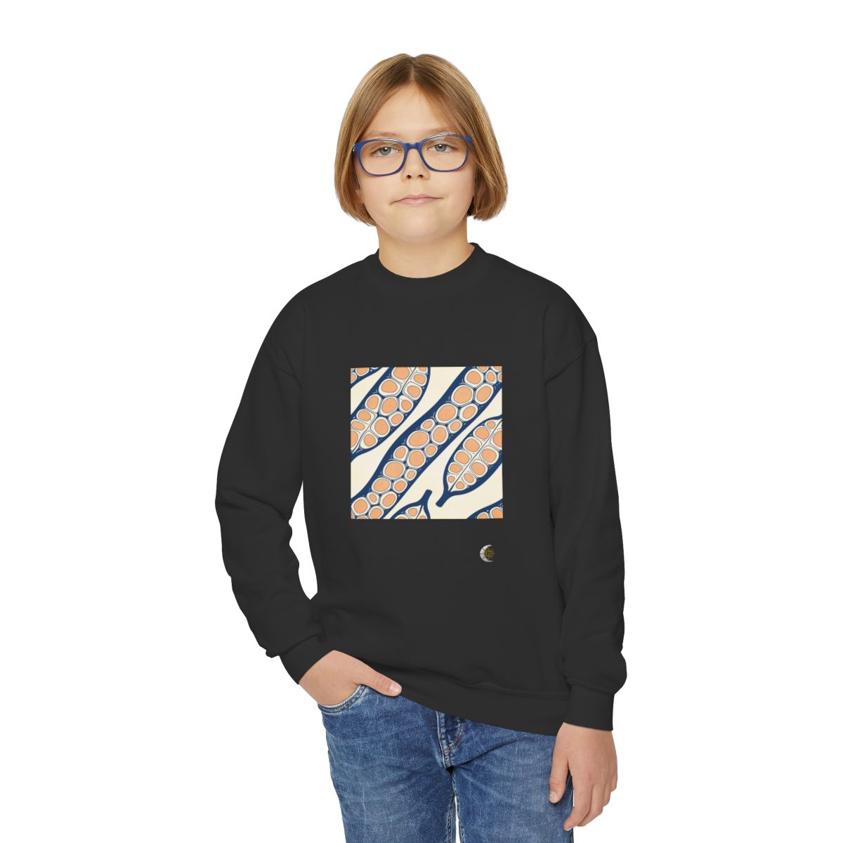 HD Apricot Seedpods Youth Crewneck Sweatshirt in Black, front view on a model.