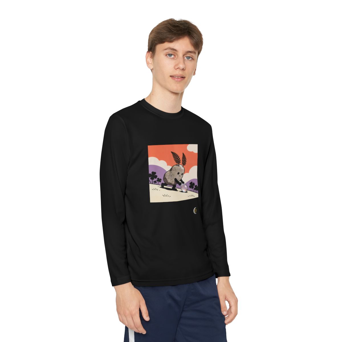 HD Pebble Gardener Youth Long Sleeve Competitor Tee in Black, front view on a model.