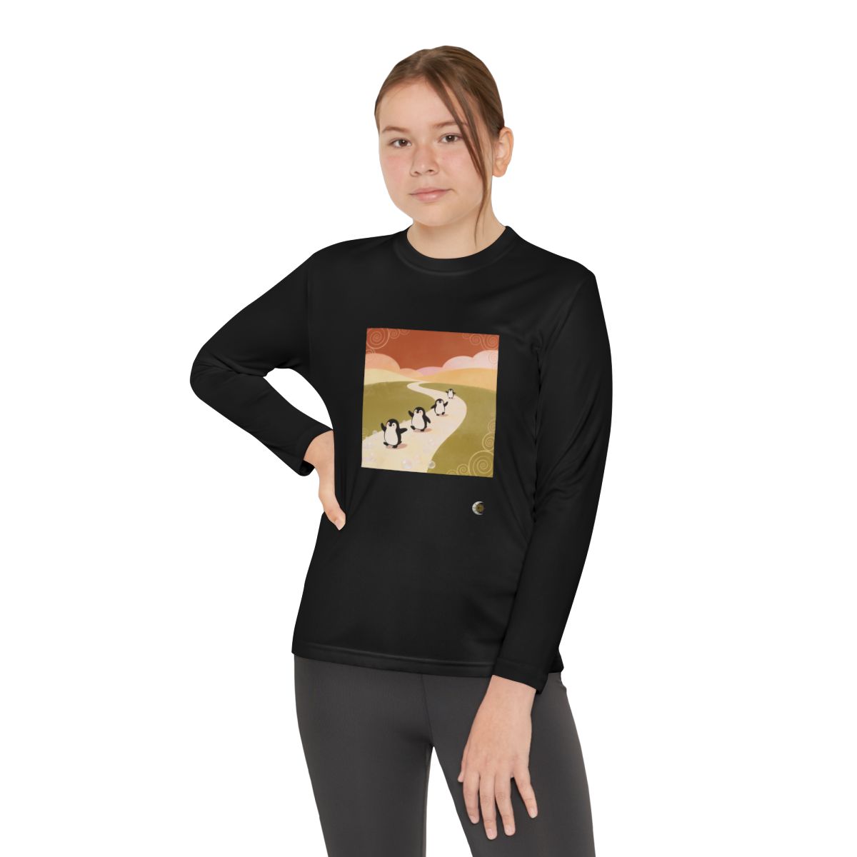 HD Ambertrail Penguins Youth Long Sleeve Competitor Tee in Black, front view on a model.