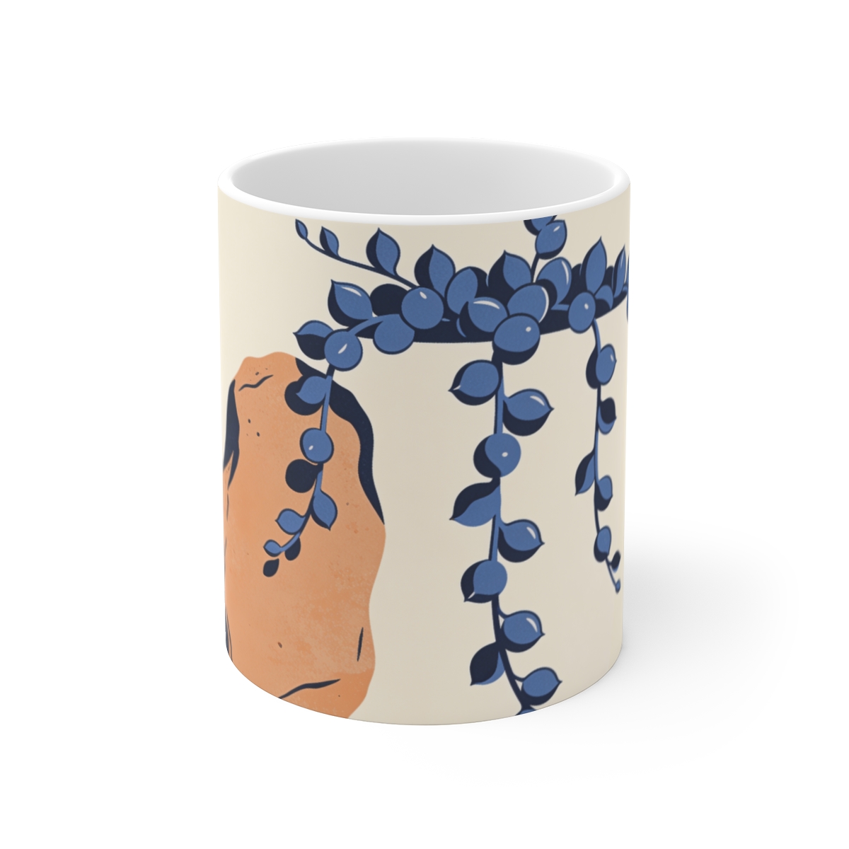 HD Trailing string-of-pearls plant balanced beside an irregular clay-colored rock Ceramic Mug 11oz