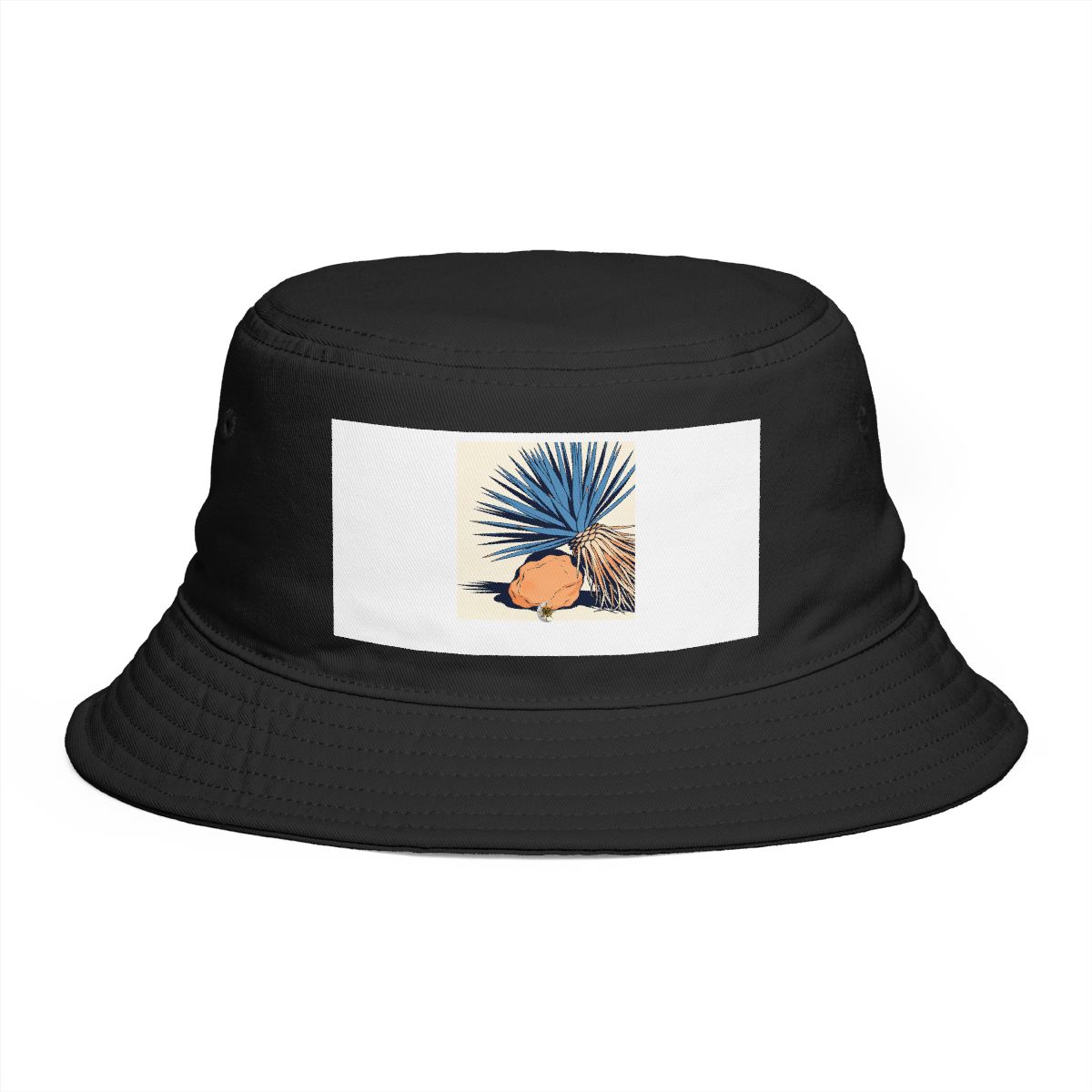 HD Yucca crown balanced beside an irregular clay-colored rock Bucket Hat