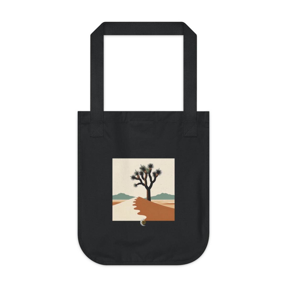 HD Joshua tree rising behind a scalloped dune Organic Canvas Tote