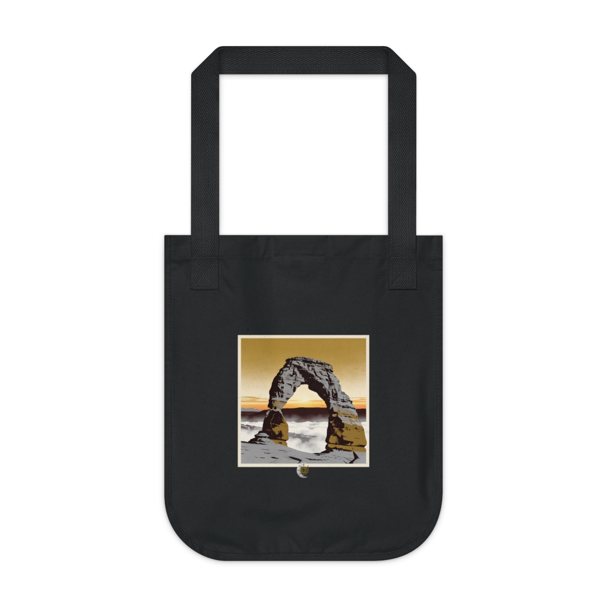 HD Coastal basalt arch rising above a broad belt of fog Organic Canvas Tote